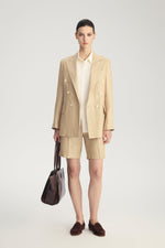 MIRA Metallic Linen Bermuda Shorts in Desert Titanium – styled front view